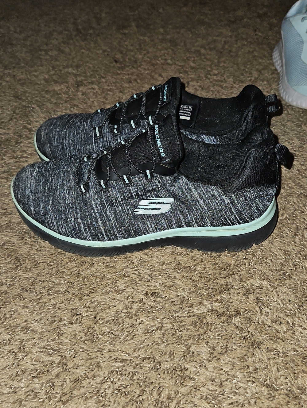 Skechers Women's Black Heather Slip-On Sneakers with Mint Trim